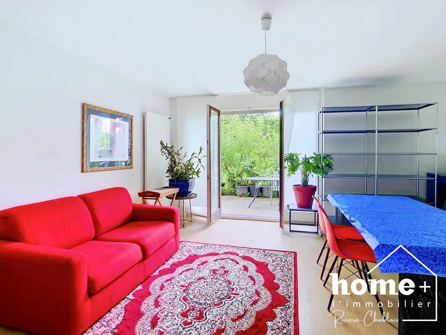 Appartement de 2,5 pièces en rez-de-jardin avec grande terrasse - Photo 3 sur 11
