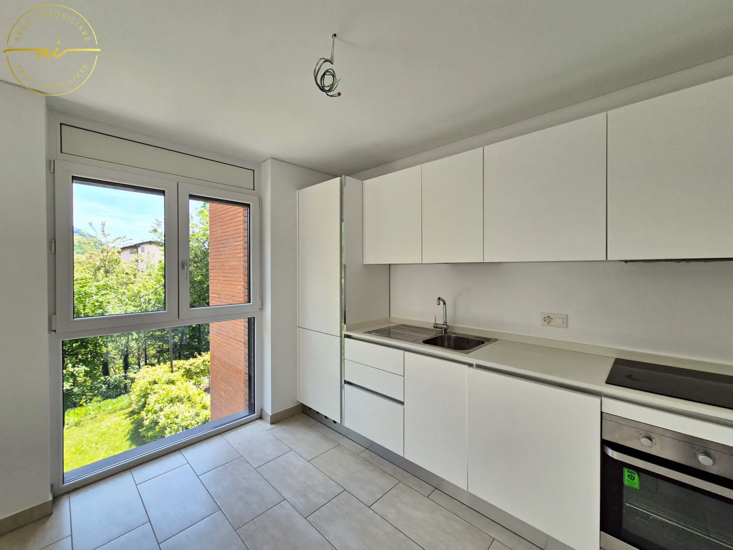 APPARTAMENTO DI 2.5 LOCALI IN MEZZO AL VERDE A CADRO - Foto 4 di 12