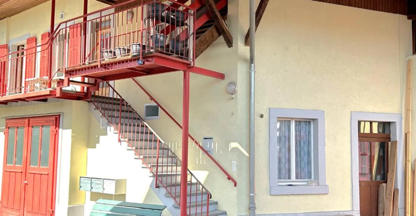 Eigentum mit mehreren Wohnungen und einer Handwerkerwerkstatt in Porrentruy - Foto 10 von 13