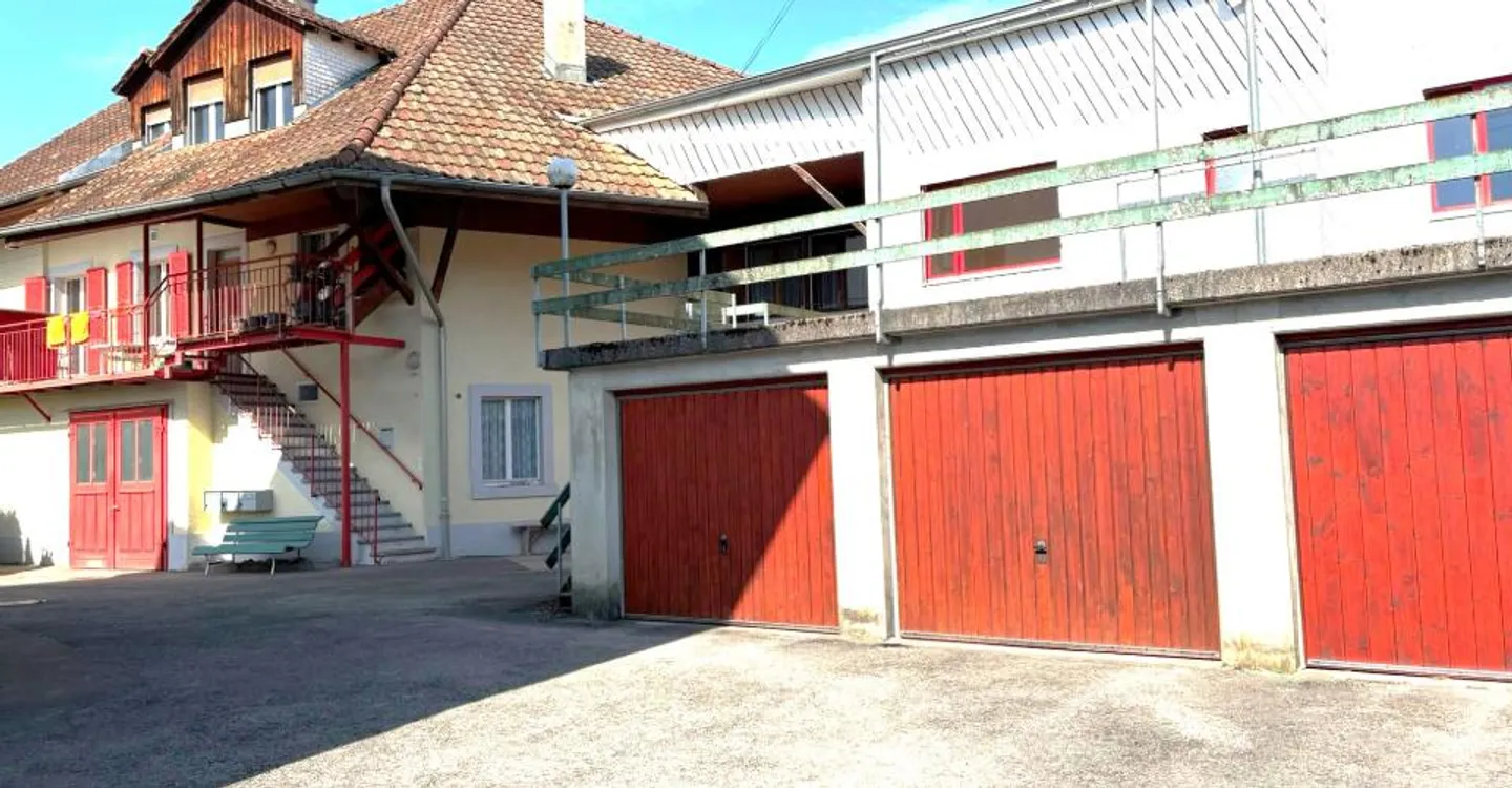 Eigentum mit mehreren Wohnungen und einer Handwerkerwerkstatt in Porrentruy - Foto 11 von 13