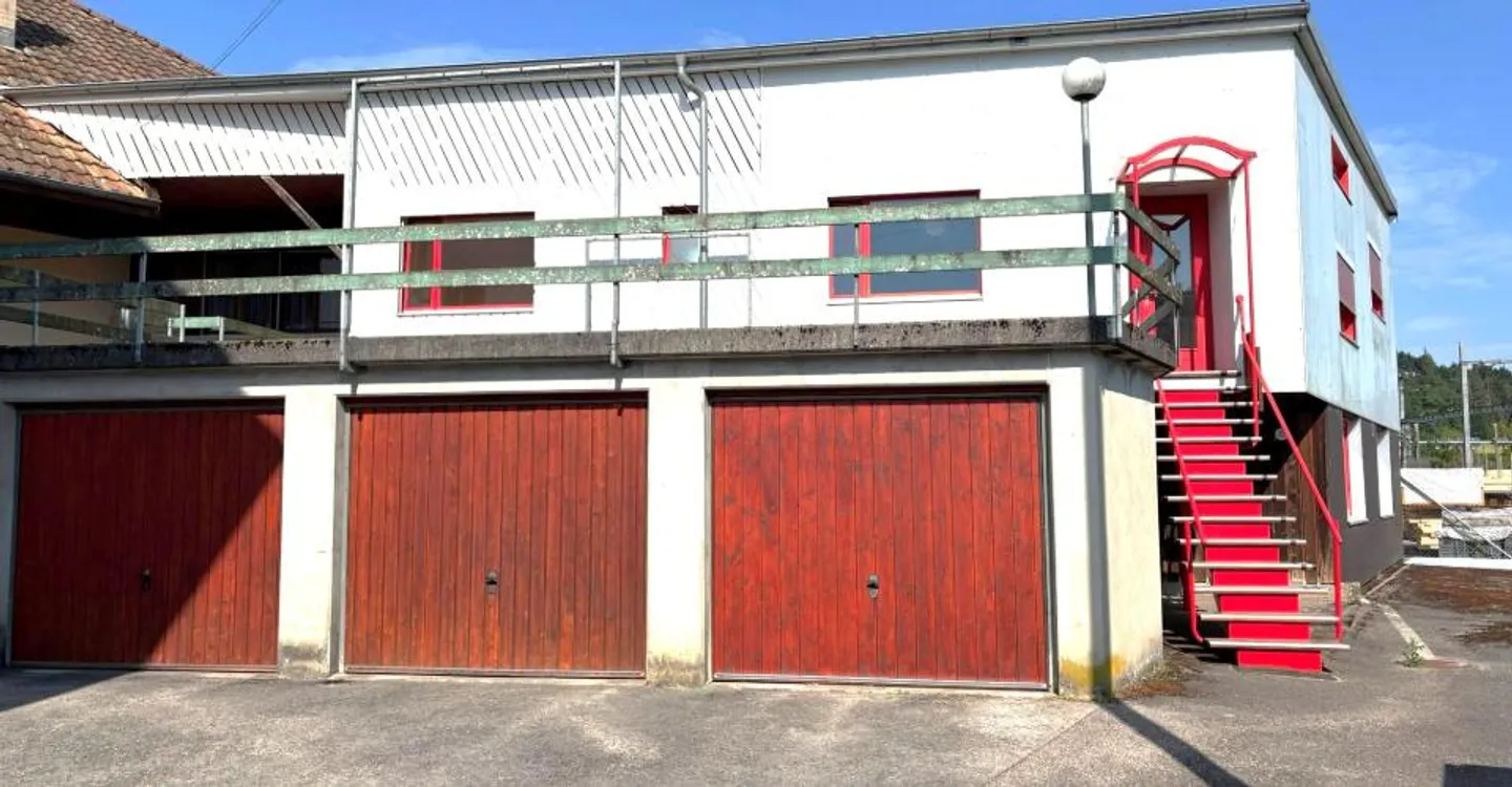 Eigentum mit mehreren Wohnungen und einer Handwerkerwerkstatt in Porrentruy - Foto 12 von 13