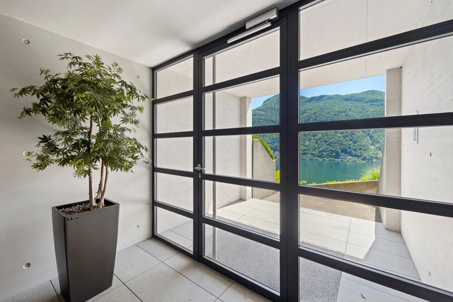 Morcote - Wunderschöne 3,5-Zimmer-Wohnung mit Seeblick und Garten - Foto 11 von 23