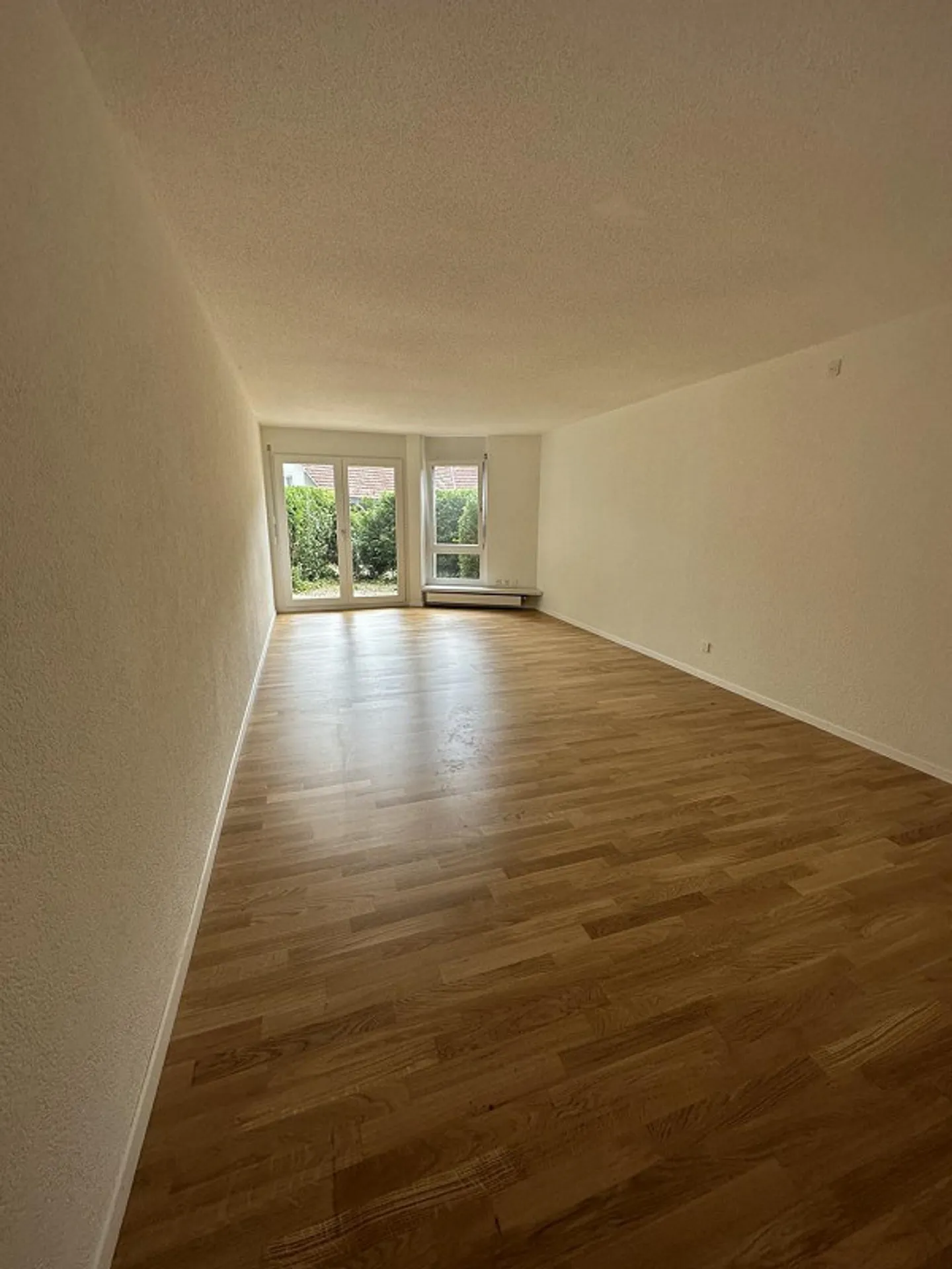 Appartement 1,5 pièces avec patio au rez-de-chaussée - Photo 2 sur 6