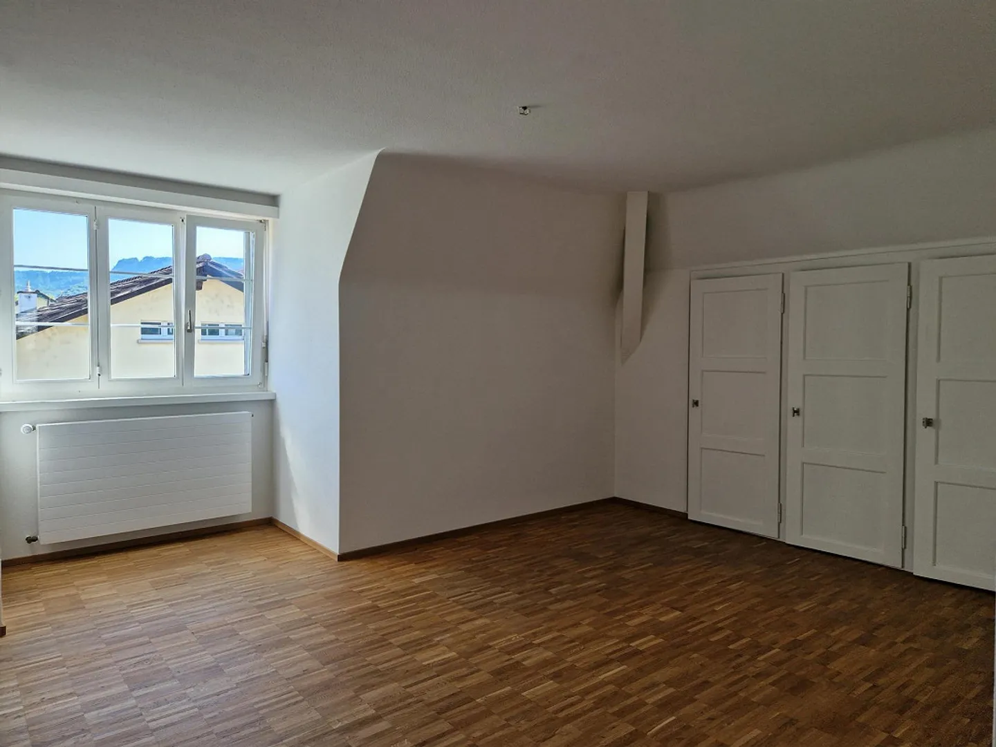 Charmante Dachwohnung - Foto 6 von 7