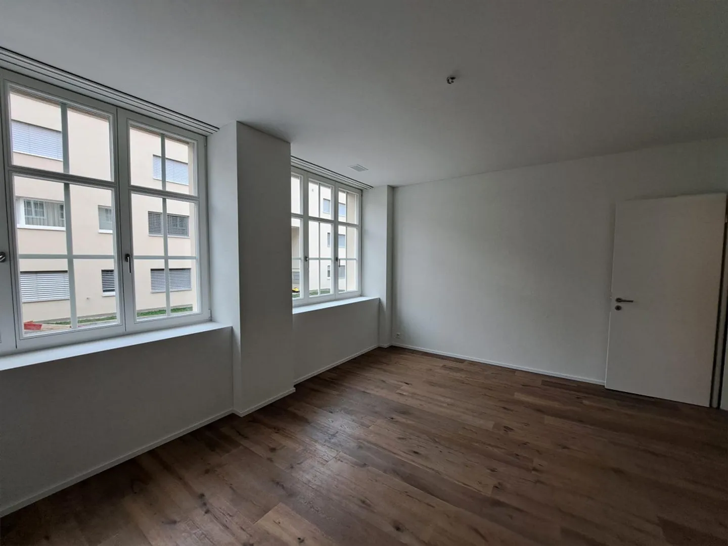 Appartement de 2.5 pièces avec loggia, coin jardin et garage - Photo 8 sur 13