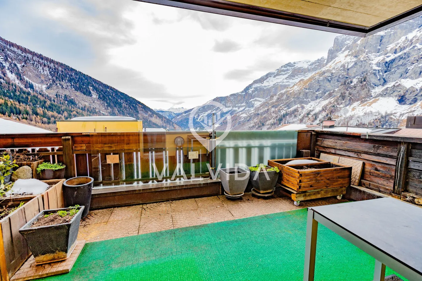 Appartement de 2 pièces avec panorama alpin, place de parking souterrain et cave - Photo 8 sur 9