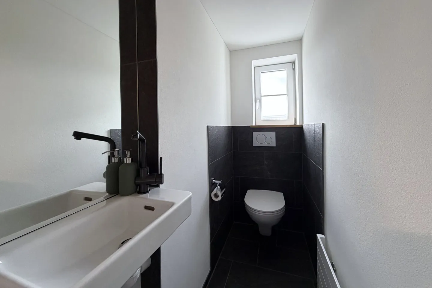 Zentrales Wohnglück in Hinwil: Historisches 6.5-Zimmer-Haus mit 2 Einheiten - Foto 9 von 12