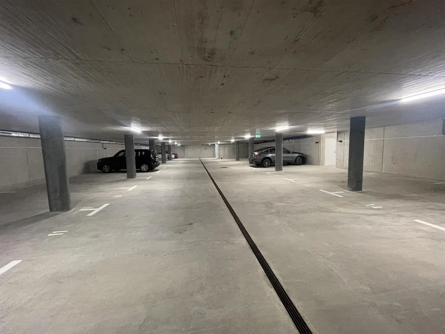 Place de parking souterrain à louer à Nürensdorf immédiatement - Photo 1 sur 2