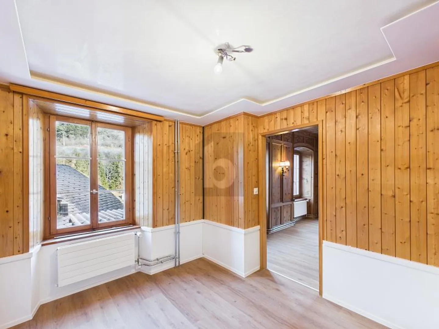 PERLE MODERNE D'ANCIEN IMMEUBLE AVEC POÊLE EN PIERRE À SAVON - Photo 3 sur 6