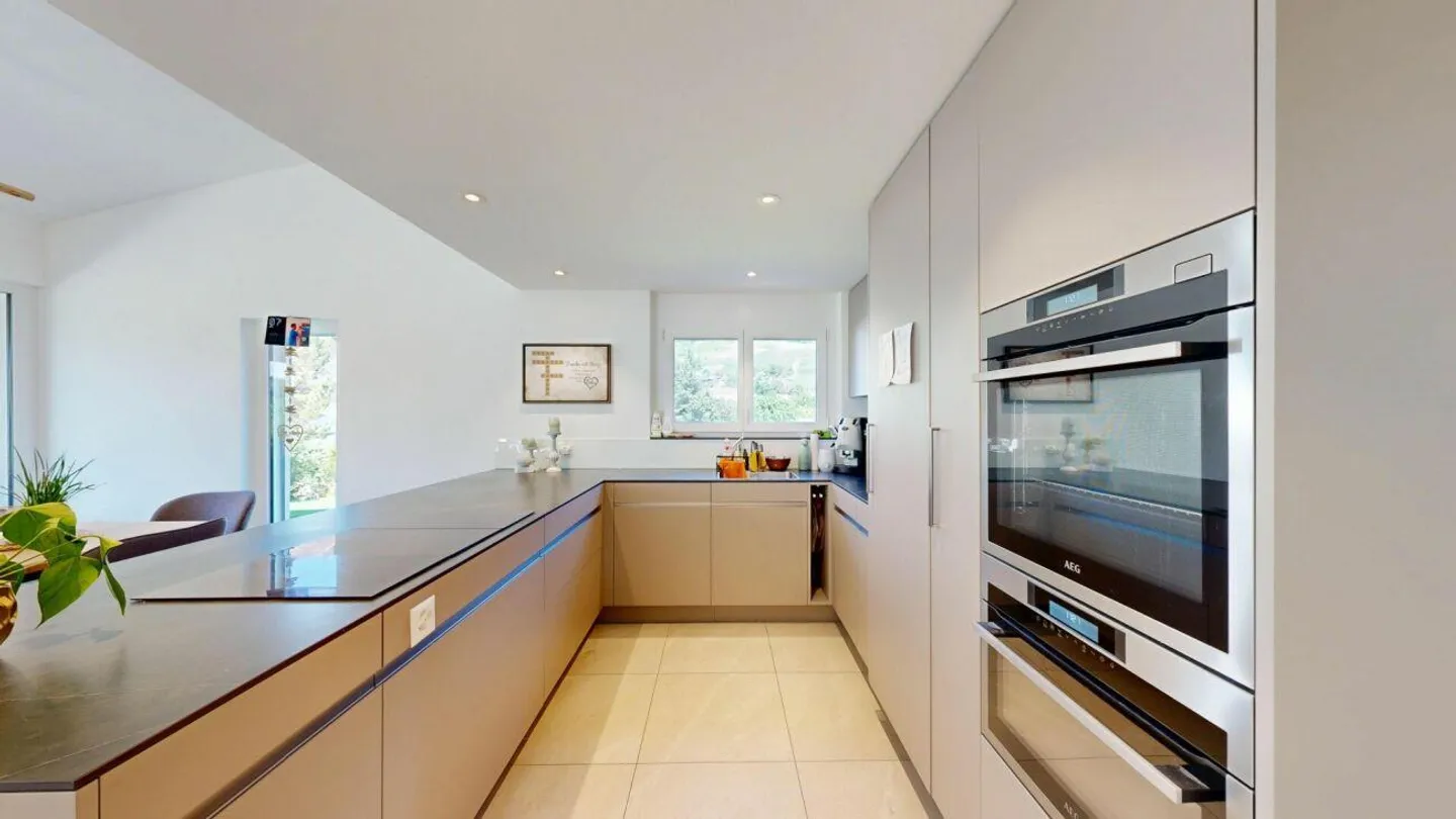 Maison individuelle moderne avec grand espace extérieur - Photo 6 sur 18