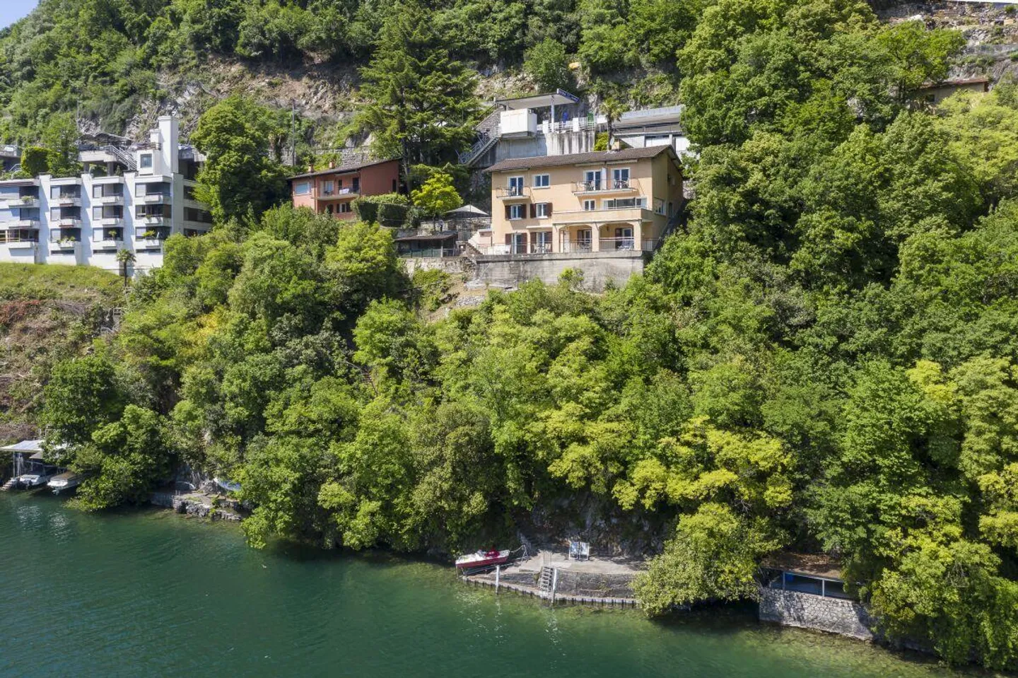 Unique opportunity: income-producing property with 7 apartments on the lake - Photo 2 of 9
