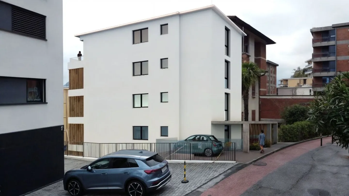 MELIDE · NEUE WOHNUNG · ELEGANTE WOHNUNG MIT TERRASSE UND PRIVATEM GARTEN - Foto 3 von 4