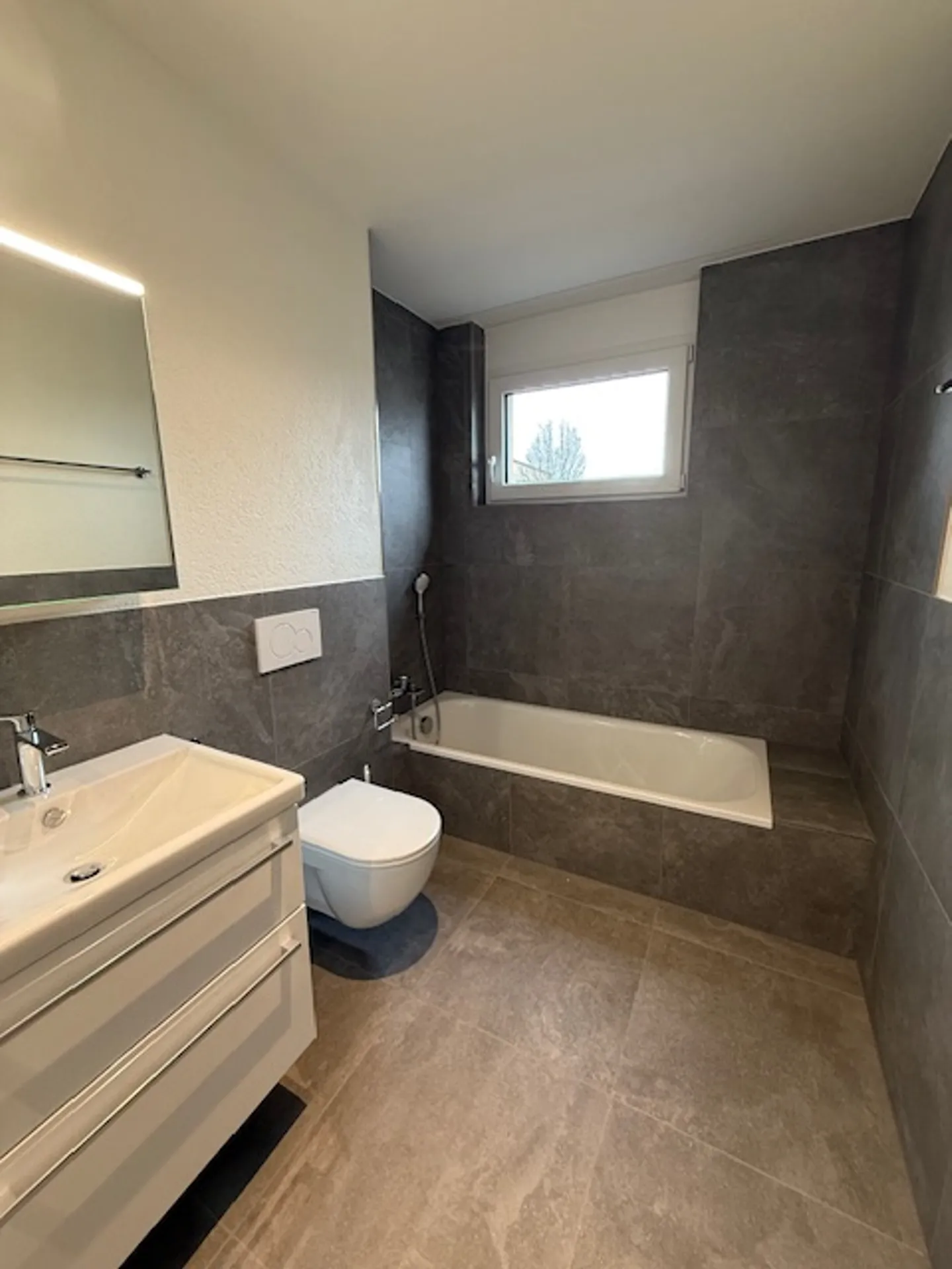 Appartement moderne au rez-de-chaussée - Photo 7 sur 10