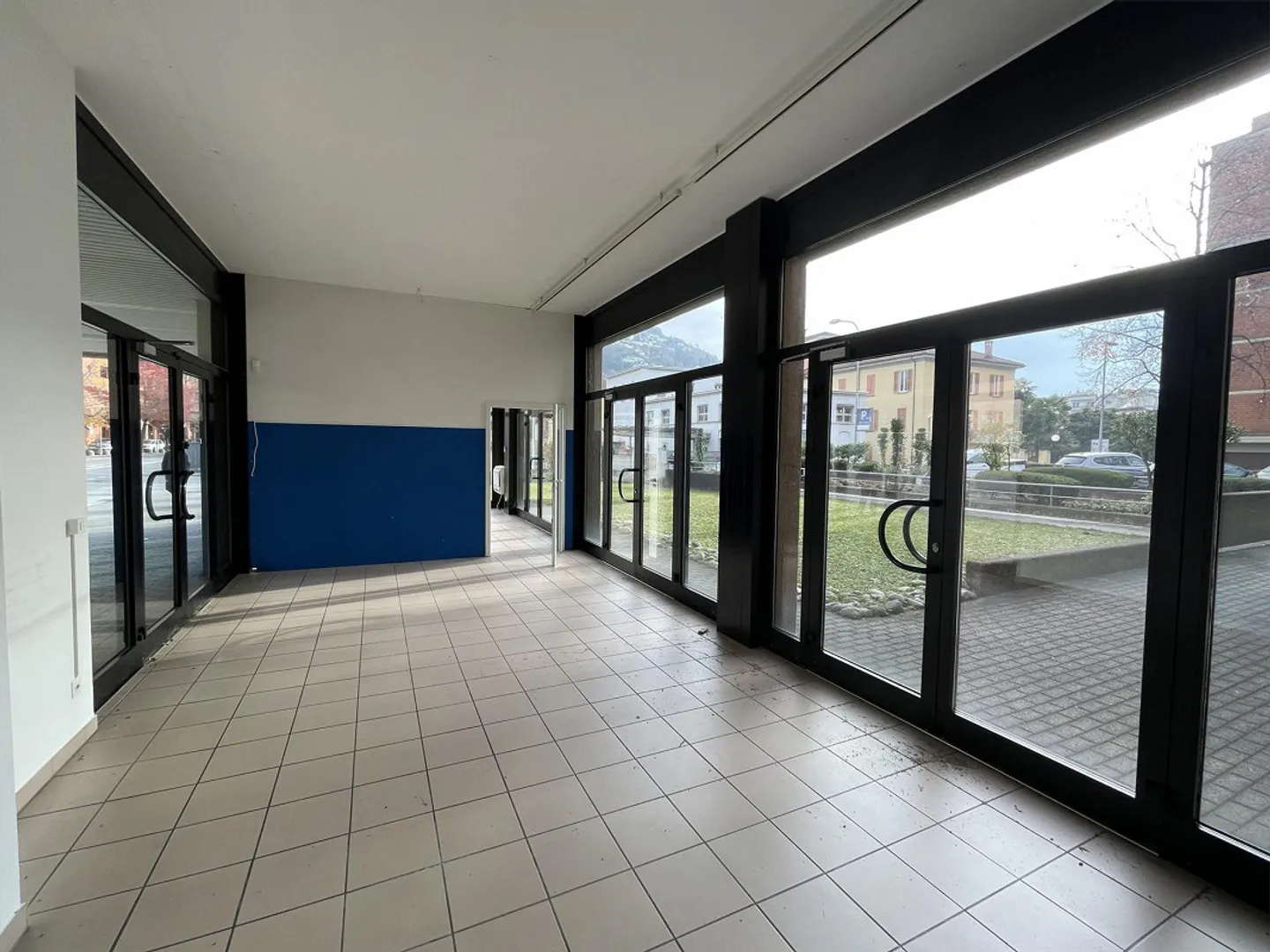 SPACIOUS COMMERCIAL SPACE WITH WINDOWS IN A HIGH-TRAFFIC AREA - Photo 3 of 13