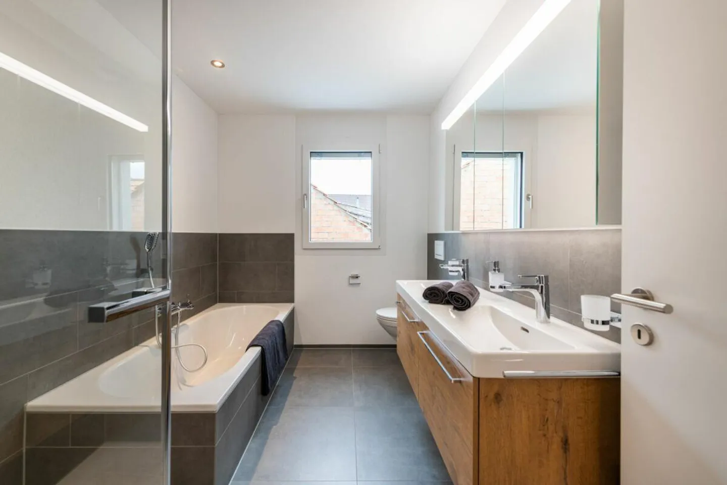 Hochwertige Wohnung mitten im Dorf - Foto 4 von 9