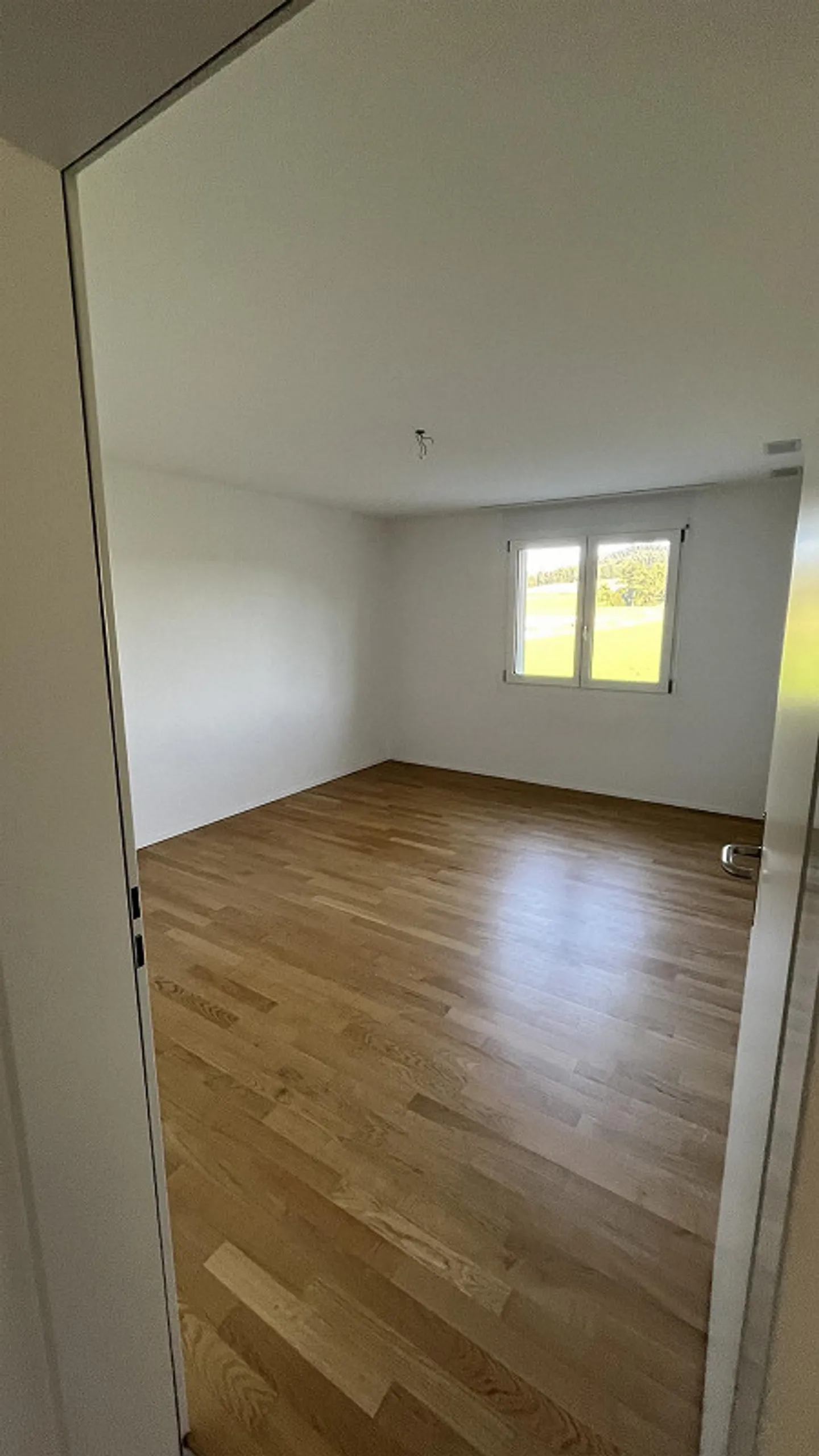 Appartement 4.5 pièces avec place de parking extérieure et souterraine avec station de recharge - Photo 6 sur 13