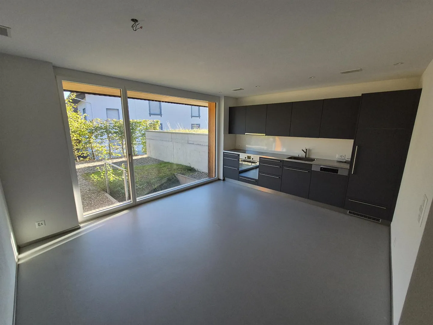 Maison de ville moderne de 3,5 pièces avec coin jardin - Photo 1 sur 12