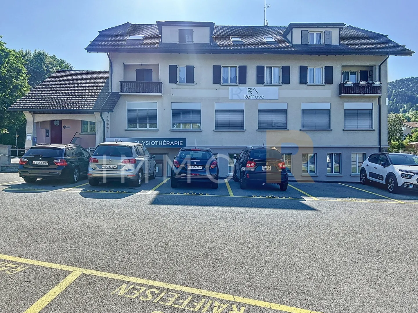 Mixed-use building in the center of Semsales - Photo 1 of 15