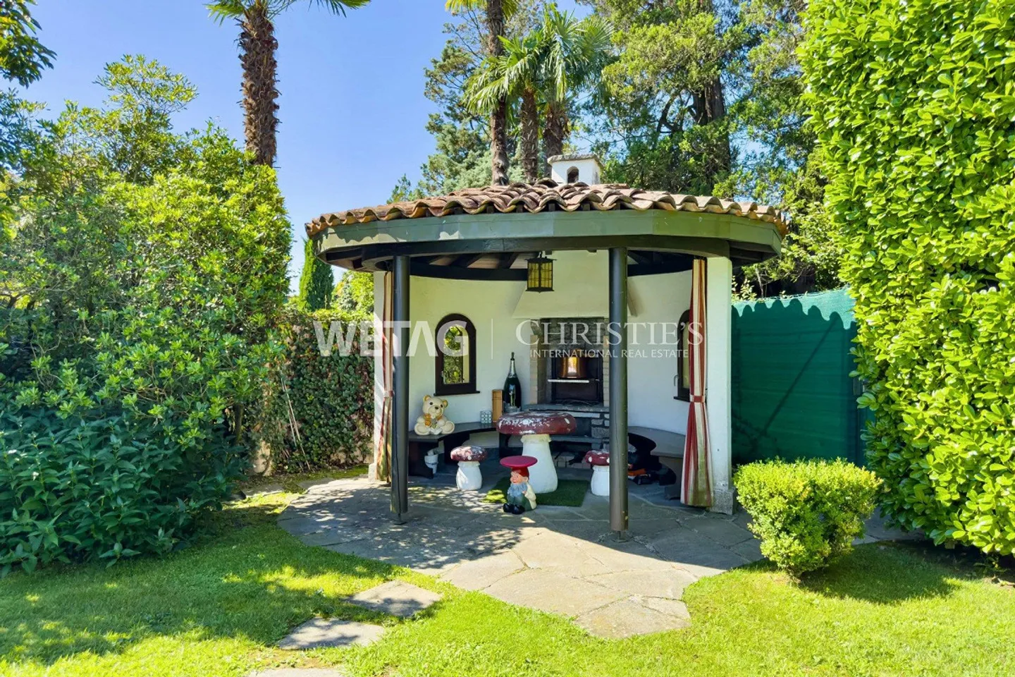 Elegant villa with pool in Lugano-Magliaso for sale, located directly on Lake Lugano - Photo 12 of 13