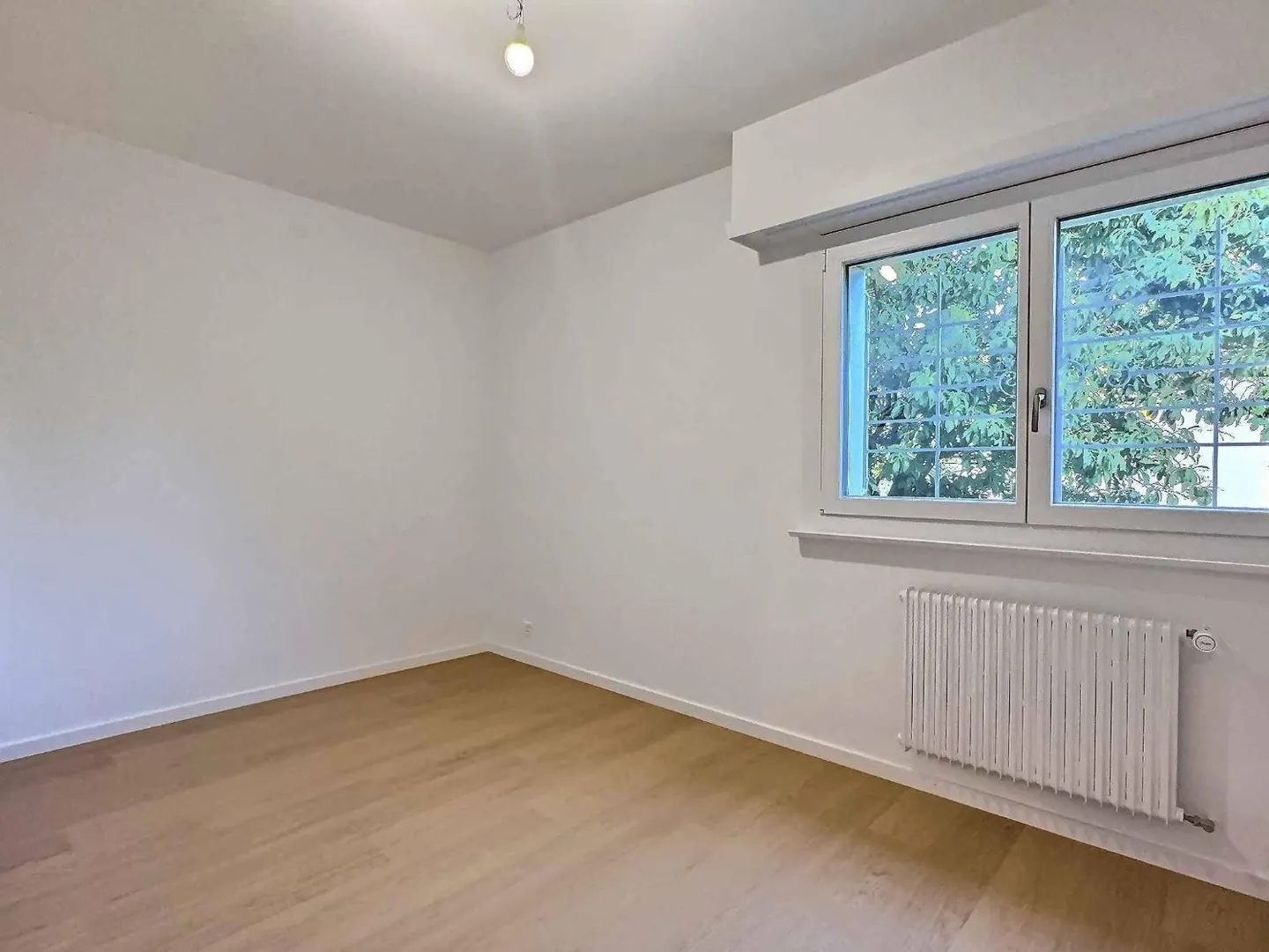 Appartement spacieux, entièrement rénové avec jardin privé à Prilly - Photo 4 sur 11