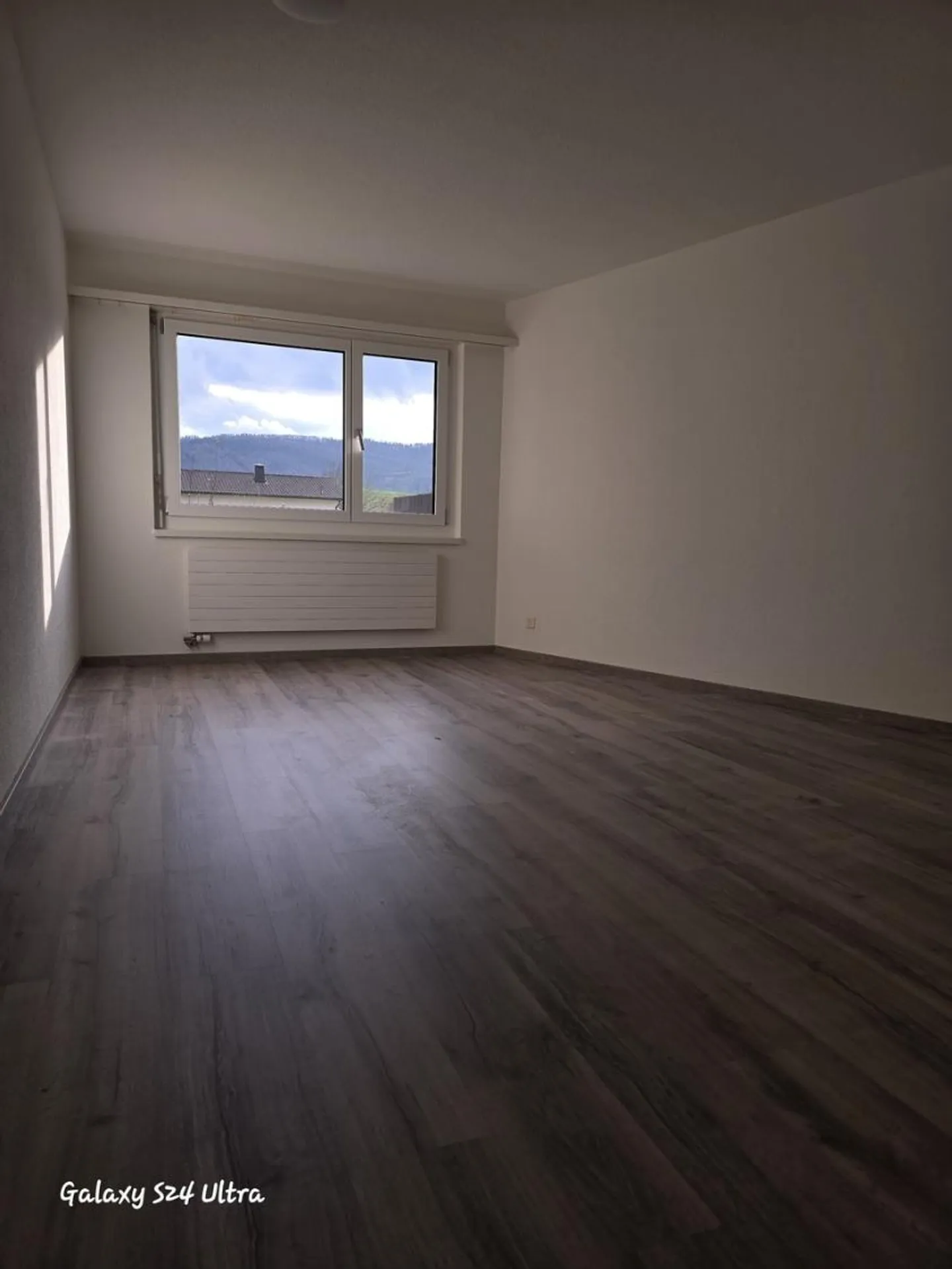Erdgeschosswohnung mit Balkon - Foto 3 von 13