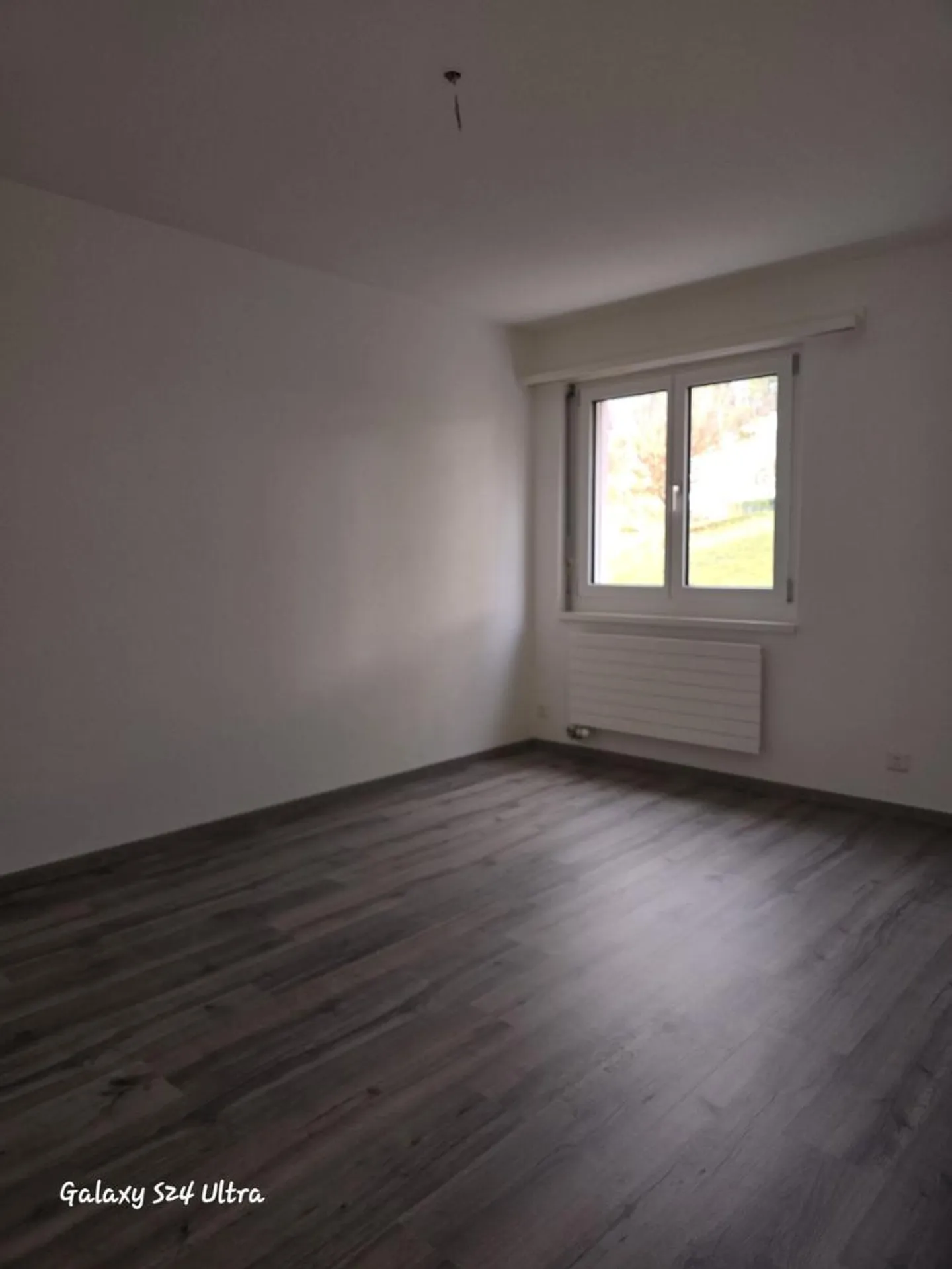 Erdgeschosswohnung mit Balkon - Foto 4 von 13