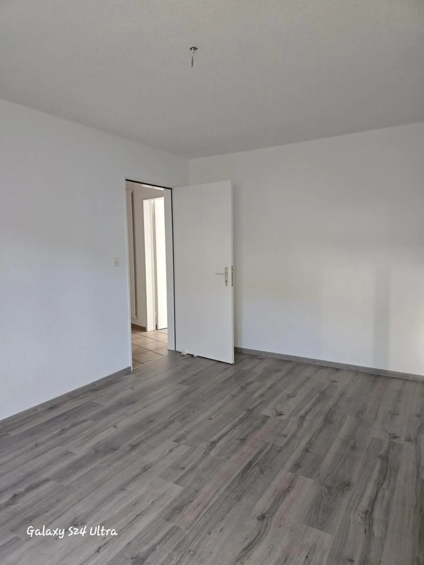 Erdgeschosswohnung mit Balkon - Foto 5 von 13