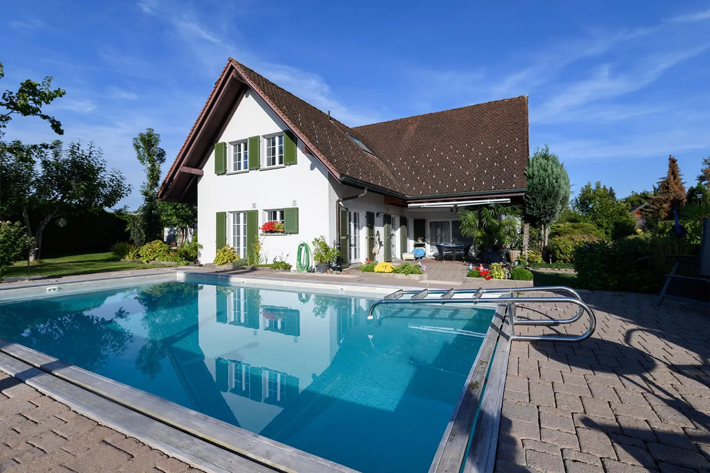 Charmantes Einfamilienhaus mit Pool - Foto 1 von 19