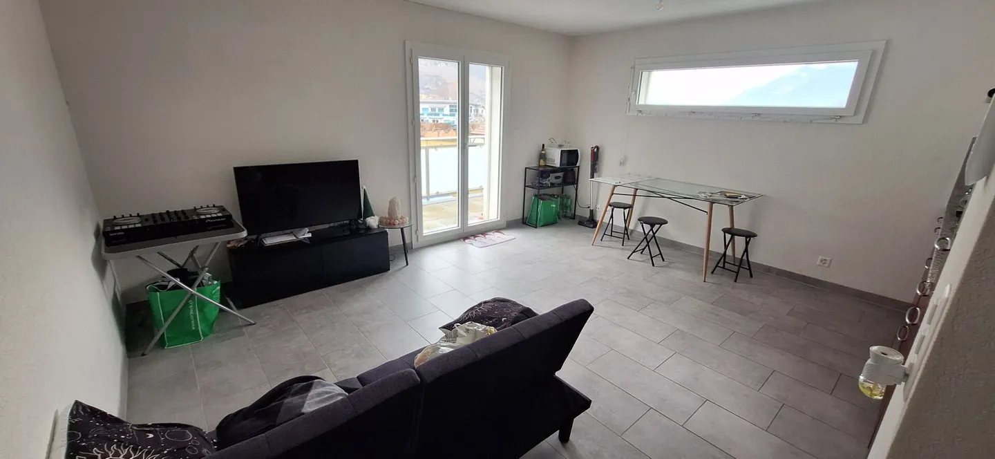 Charmant appartement 2.5 pièces - Photo 2 sur 7