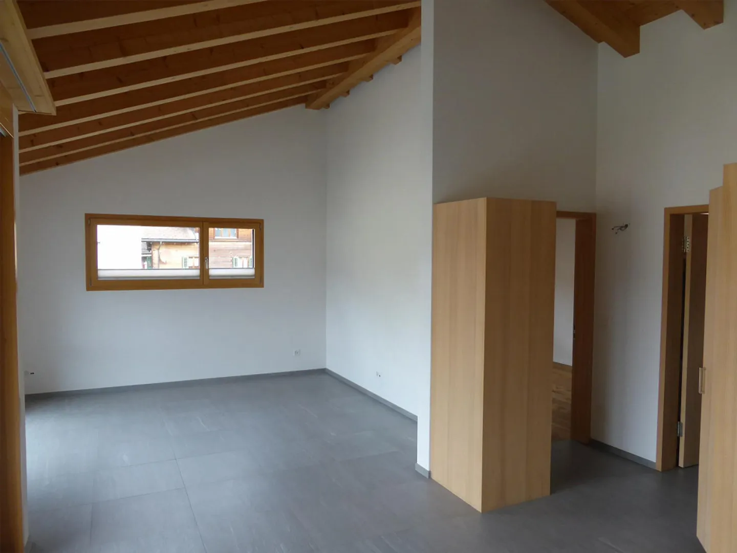 Neuwertige 3 1/2 Zimmerwohnung an ruhiger Lage im Dorfkern - Foto 1 von 9