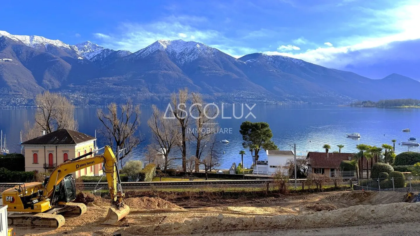 Eleganza, Design e Lusso: Ampio appartamento di 4,5 locali con terrazza e vista mozzafiato sul lago - Foto 1 di 13