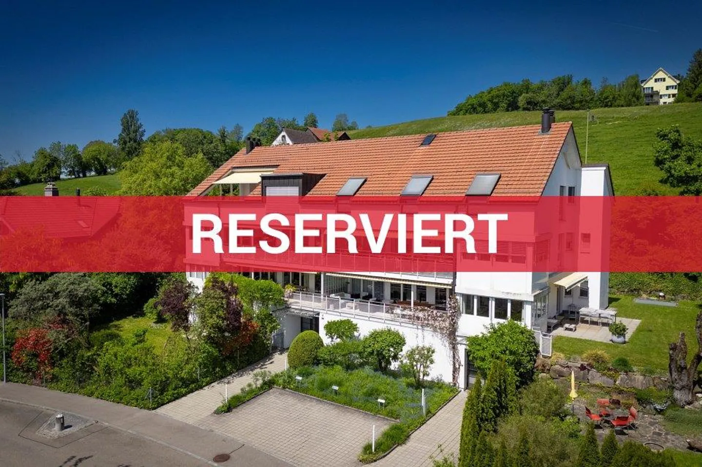 Komfortable 4½-Zimmer-Wohnung am Sonnenhang mit Seesicht im steuergünstigen Herrliberg - Foto 1 von 1