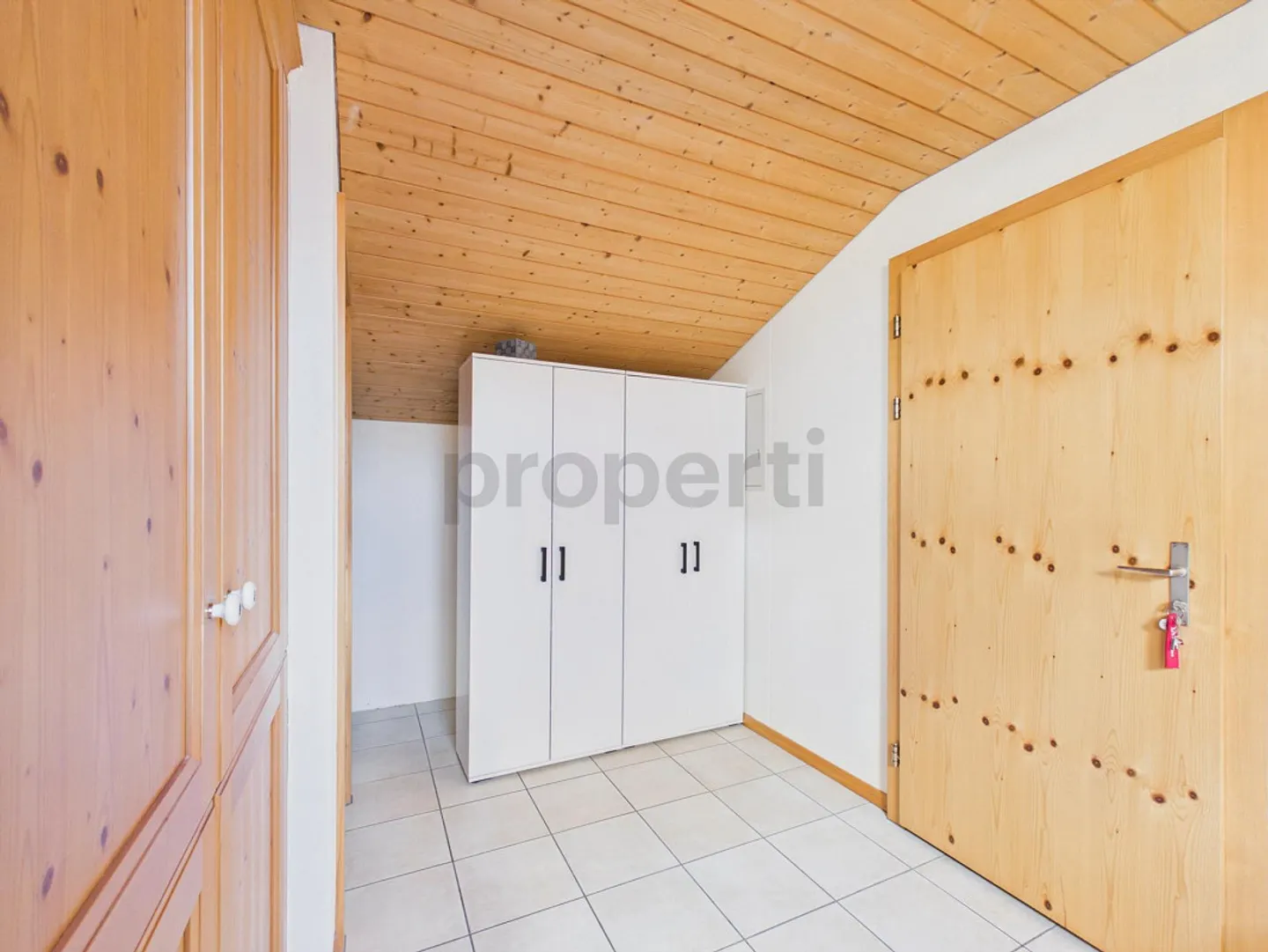 Charmante Dachwohnung mit Bergsicht - Foto 5 von 10