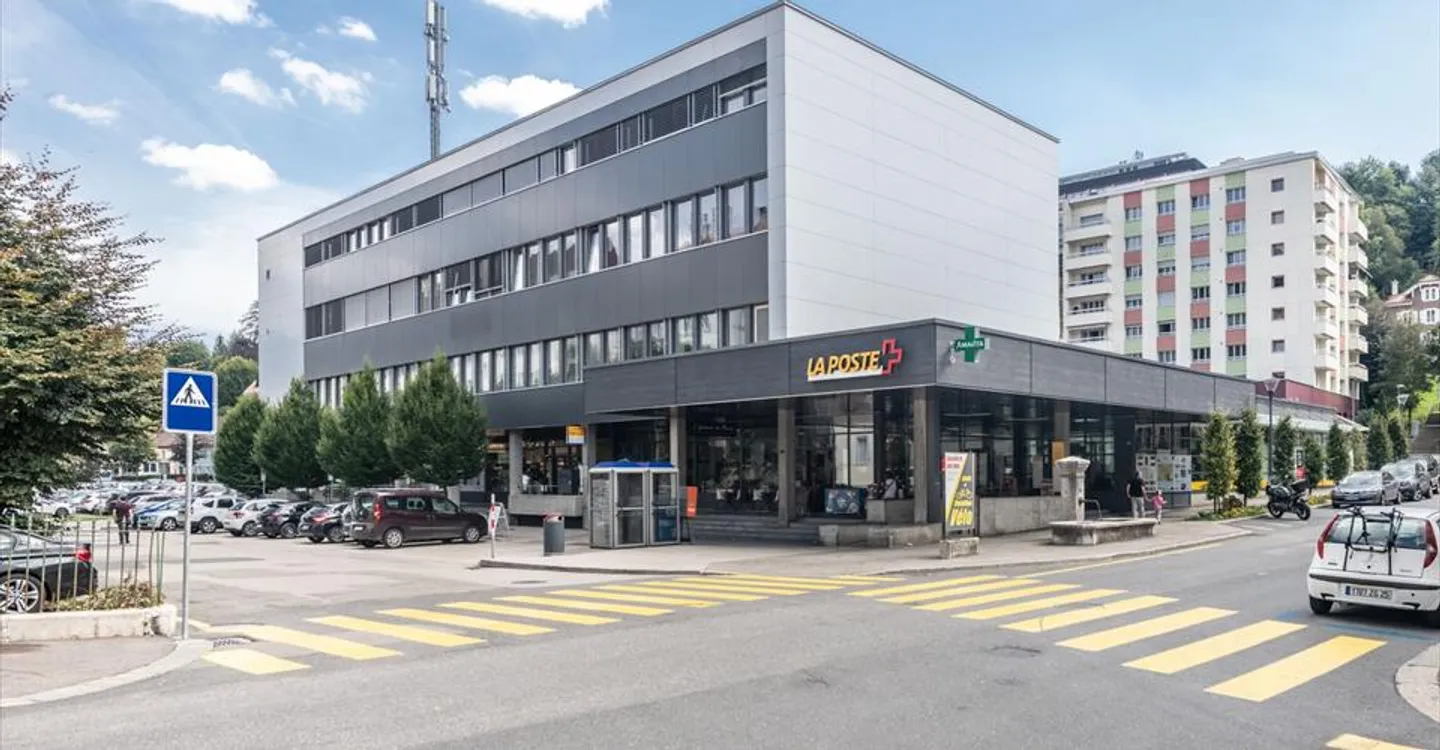 Spazio amministrativo di circa 290m2 in affitto al 1° piano a Locle - Foto 1 di 4