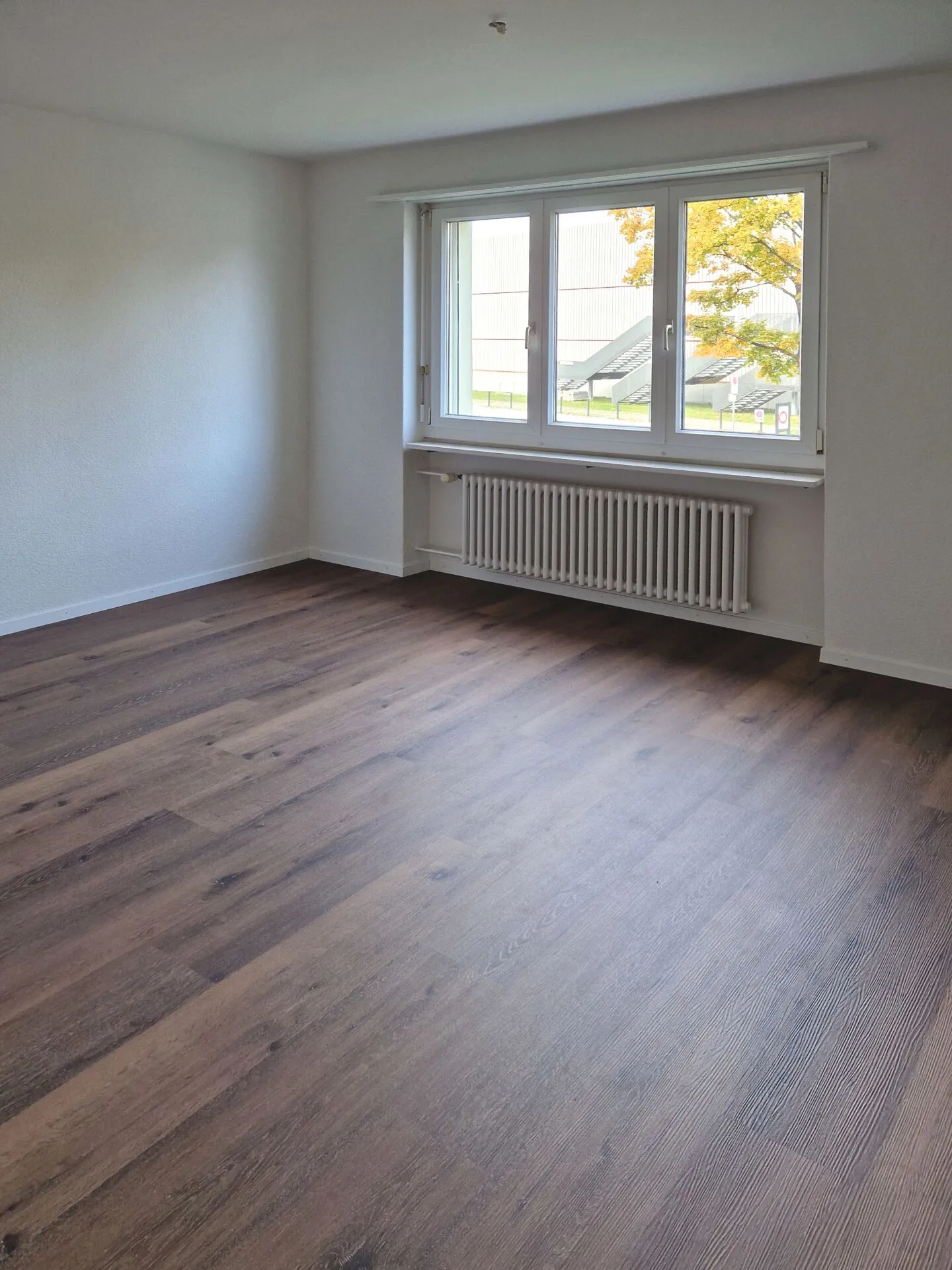 3-room apartment with balcony 1st floor right - Photo 4 of 6