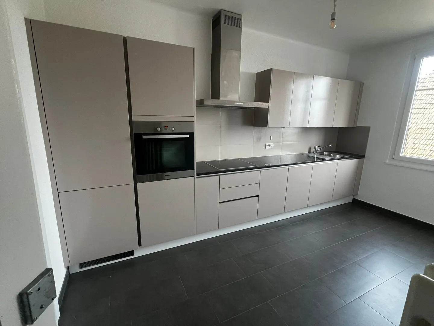 Appartement de caractère au dernier étage - Photo 1 sur 11