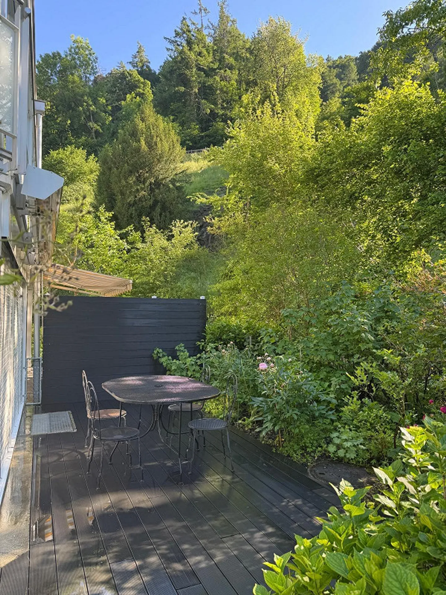 Appartement au rez-de-chaussée élégant avec jardin d'hiver et part de terrain - Photo 24 sur 26