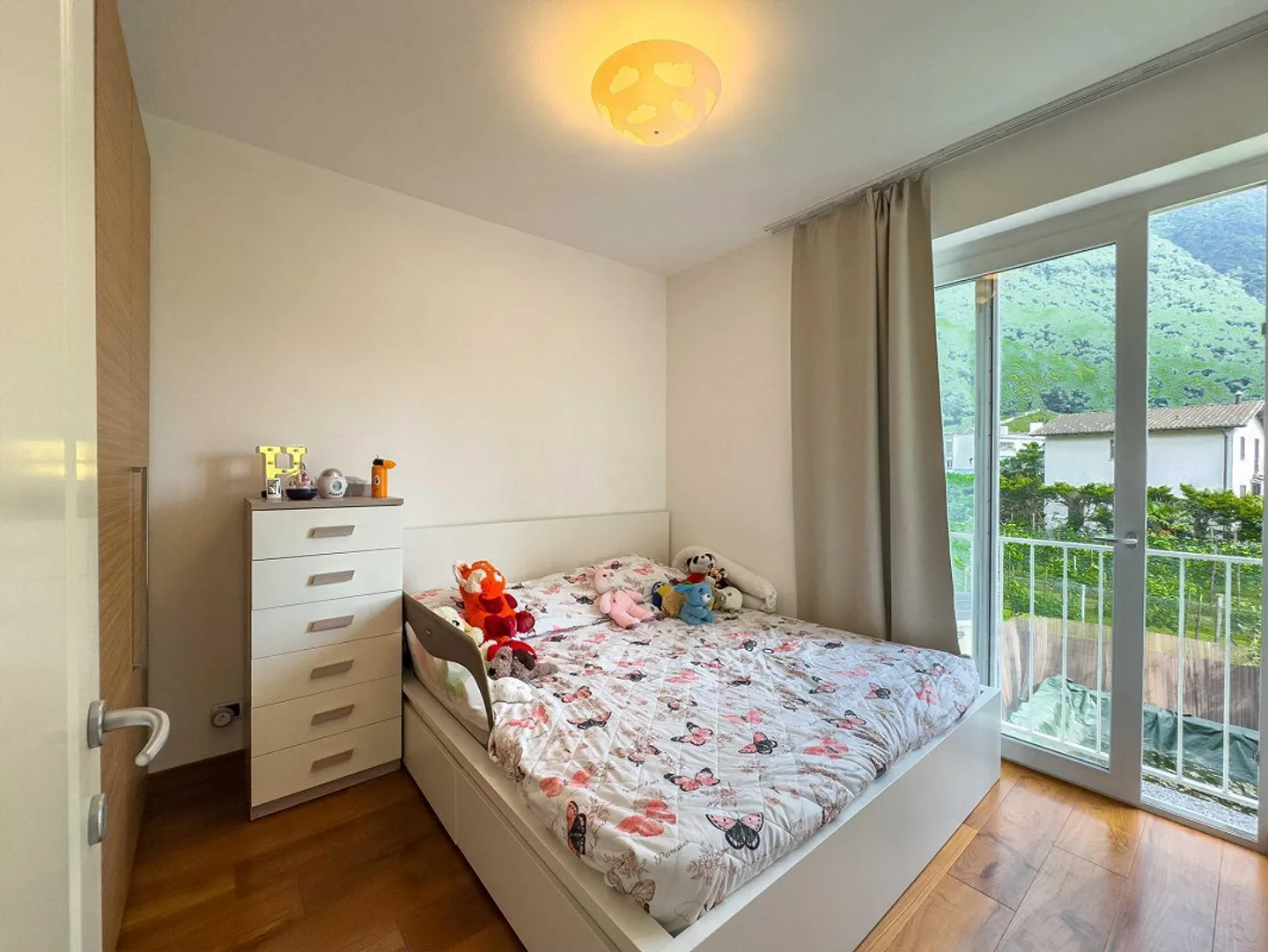 Large and bright twin house in Melano - Photo 5 of 9