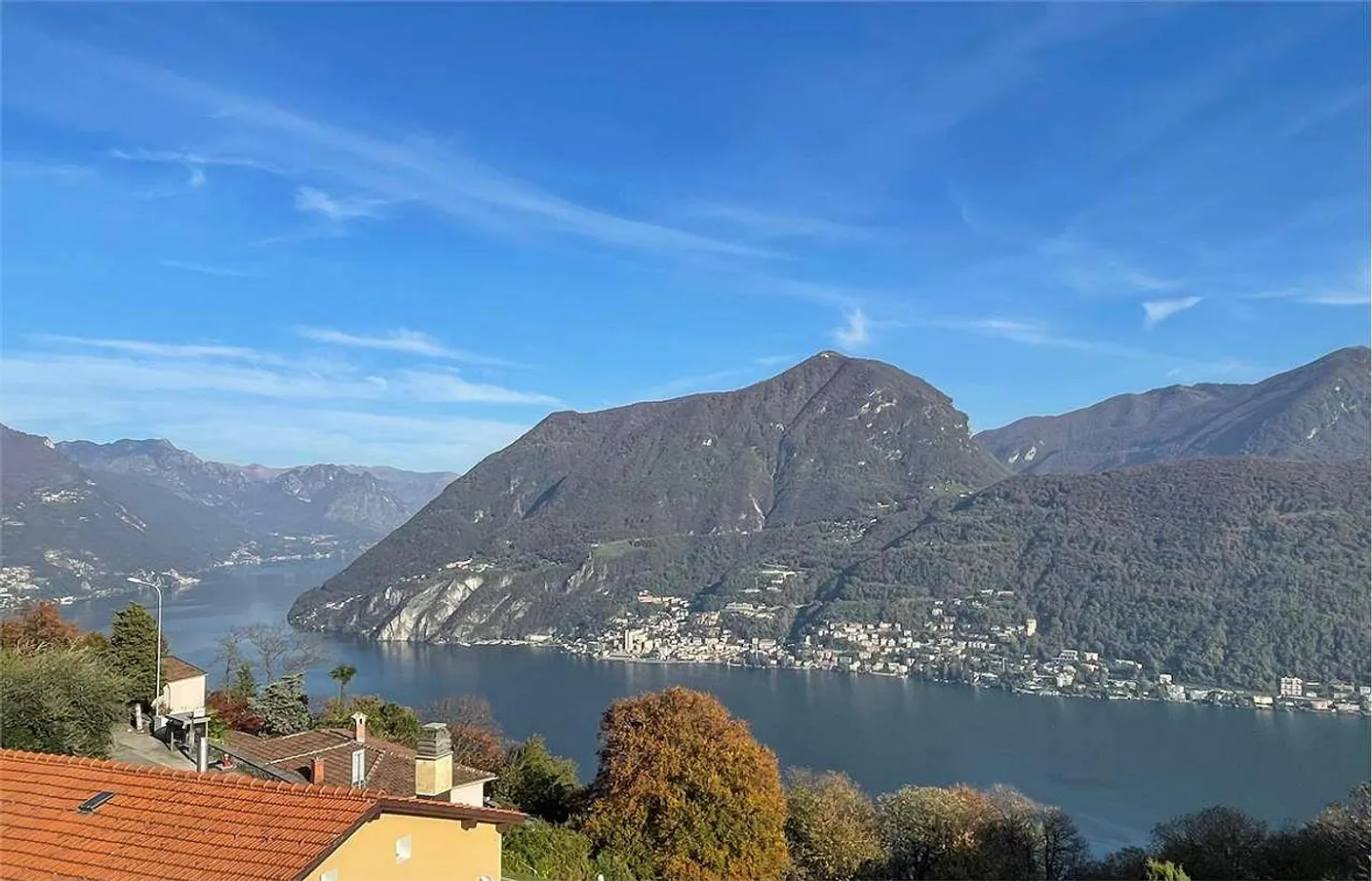 Casa con due unità abitative e vista mozzafiato sul lago a Carona - Foto 1 di 10