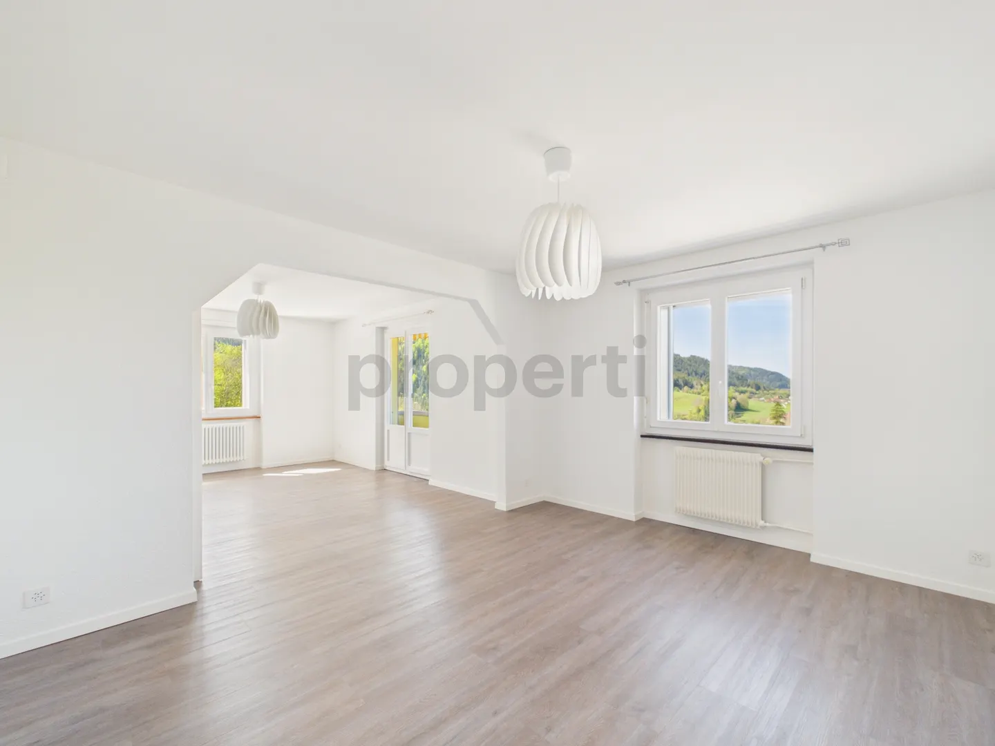 Charming 3.5 rooms in a peaceful living environment between nature and comfort - Photo 3 of 7