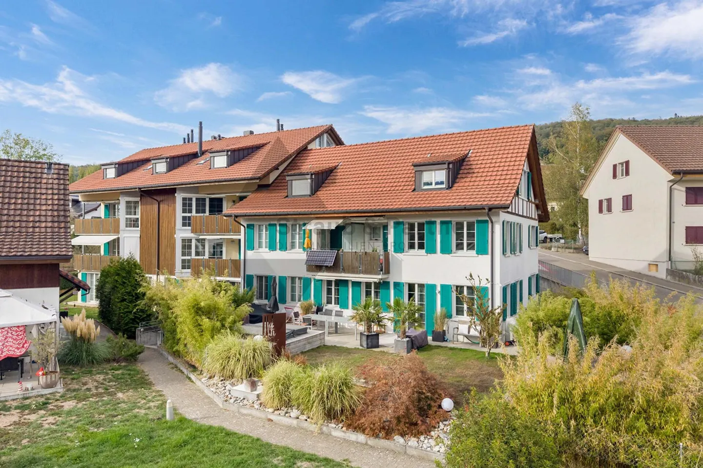 Jewel with Balcony and Garden Seating Area in the Heart of Oberweningen - Photo 1 of 11