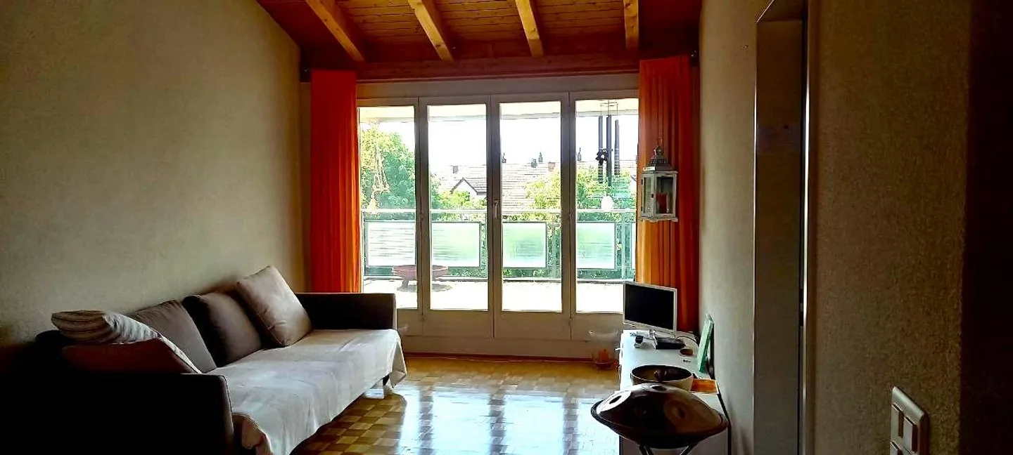 Charming 3.5-room attic apartment with two balconies - Photo 2 of 6