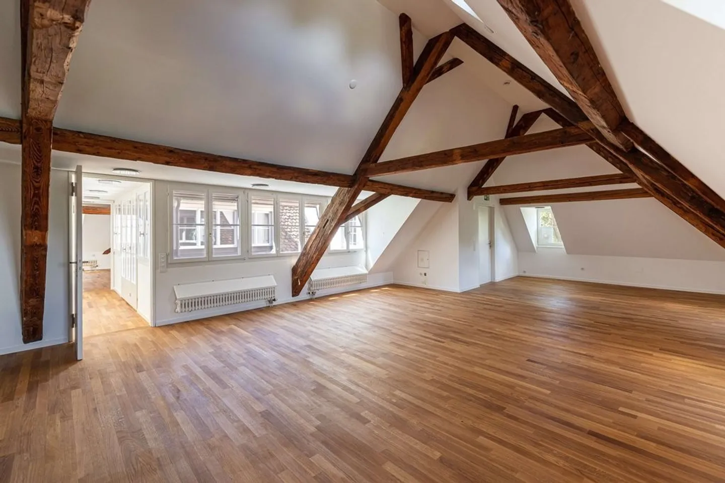 Office in the attic of a historic building - Photo 2 of 10