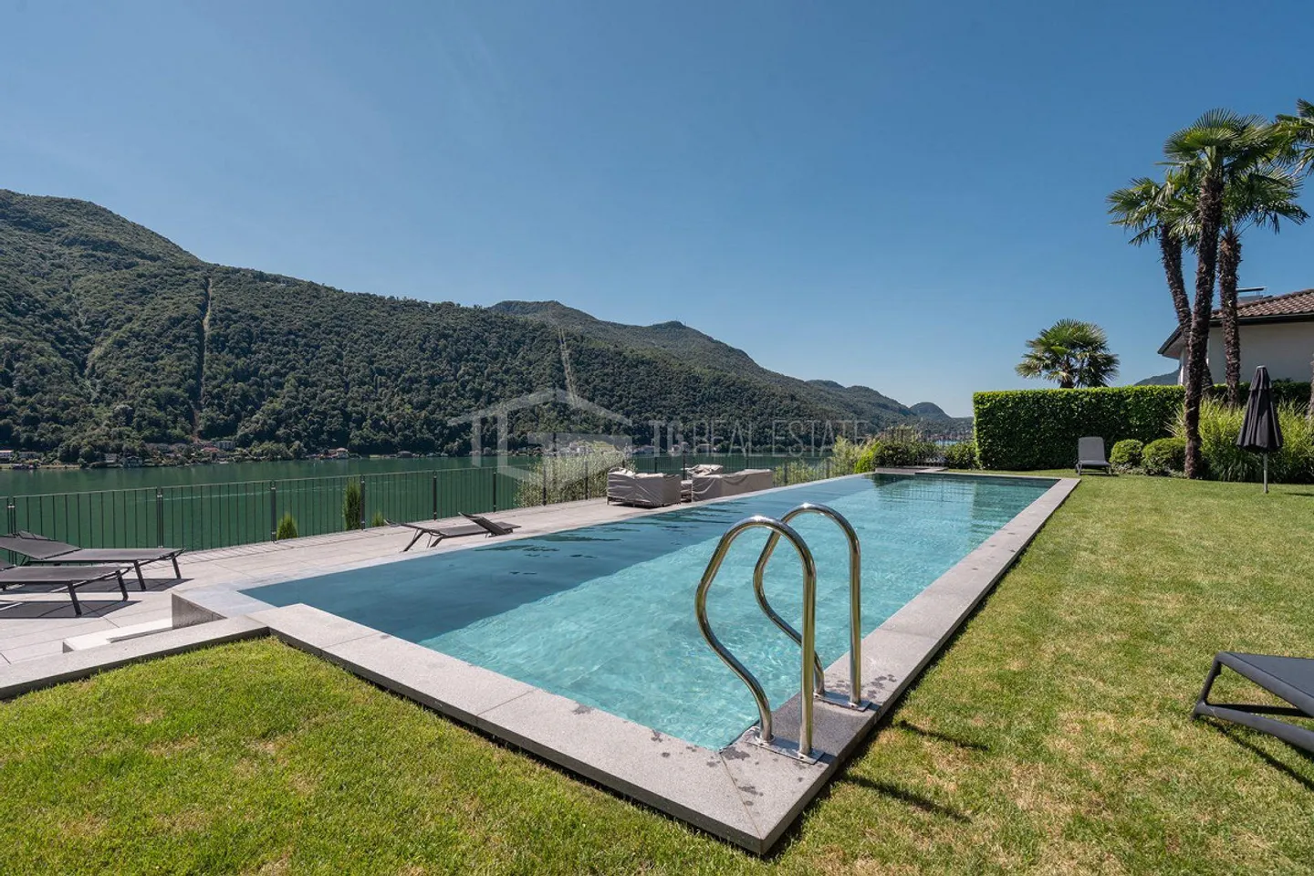 ELEGANTE APPARTAMENTO DI 4 LOCALI CON GIARDINO E VISTA LAGO - Photo 18 sur 19