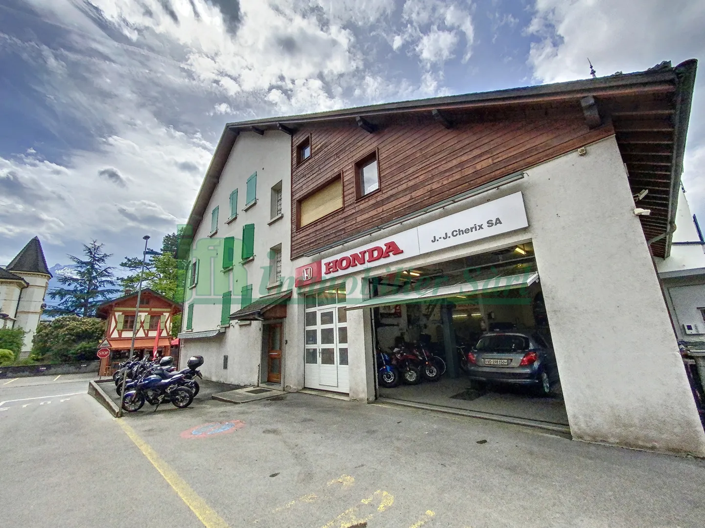 Wohn- und Geschäftshaus in Bex - Foto 3 von 10
