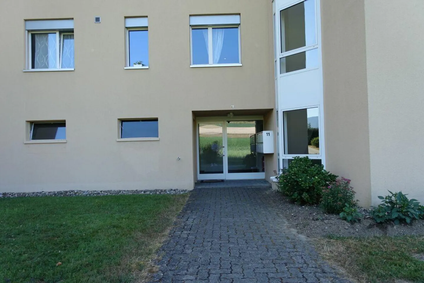 Appartement en copropriété de 3,5 pièces avec balcon et place de parking - Photo 1 sur 21