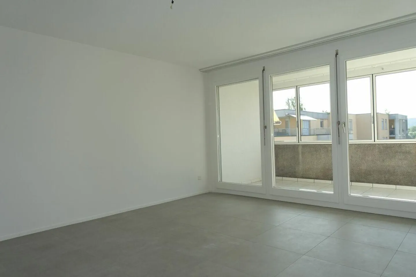 Appartement en copropriété de 3,5 pièces avec balcon et place de parking - Photo 5 sur 21