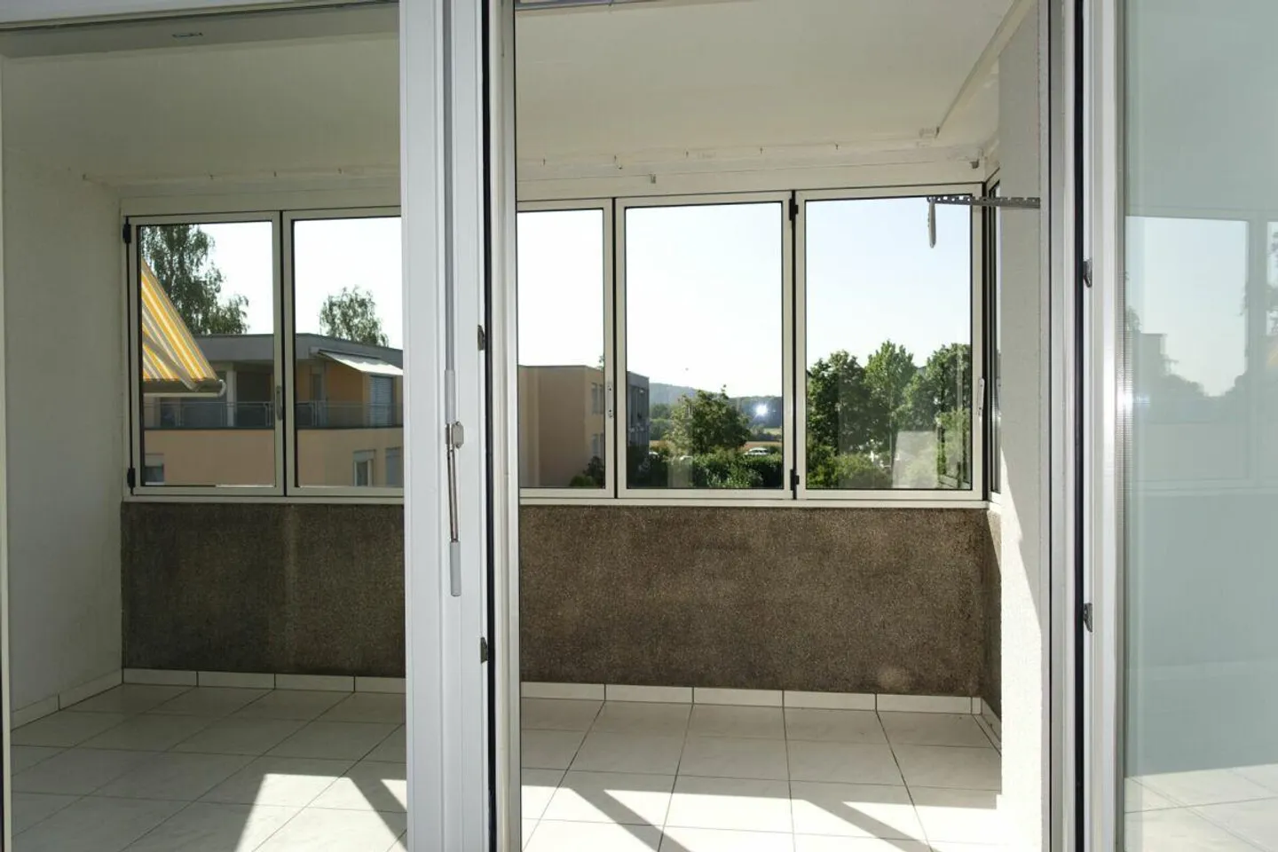 Appartement en copropriété de 3,5 pièces avec balcon et place de parking - Photo 6 sur 21
