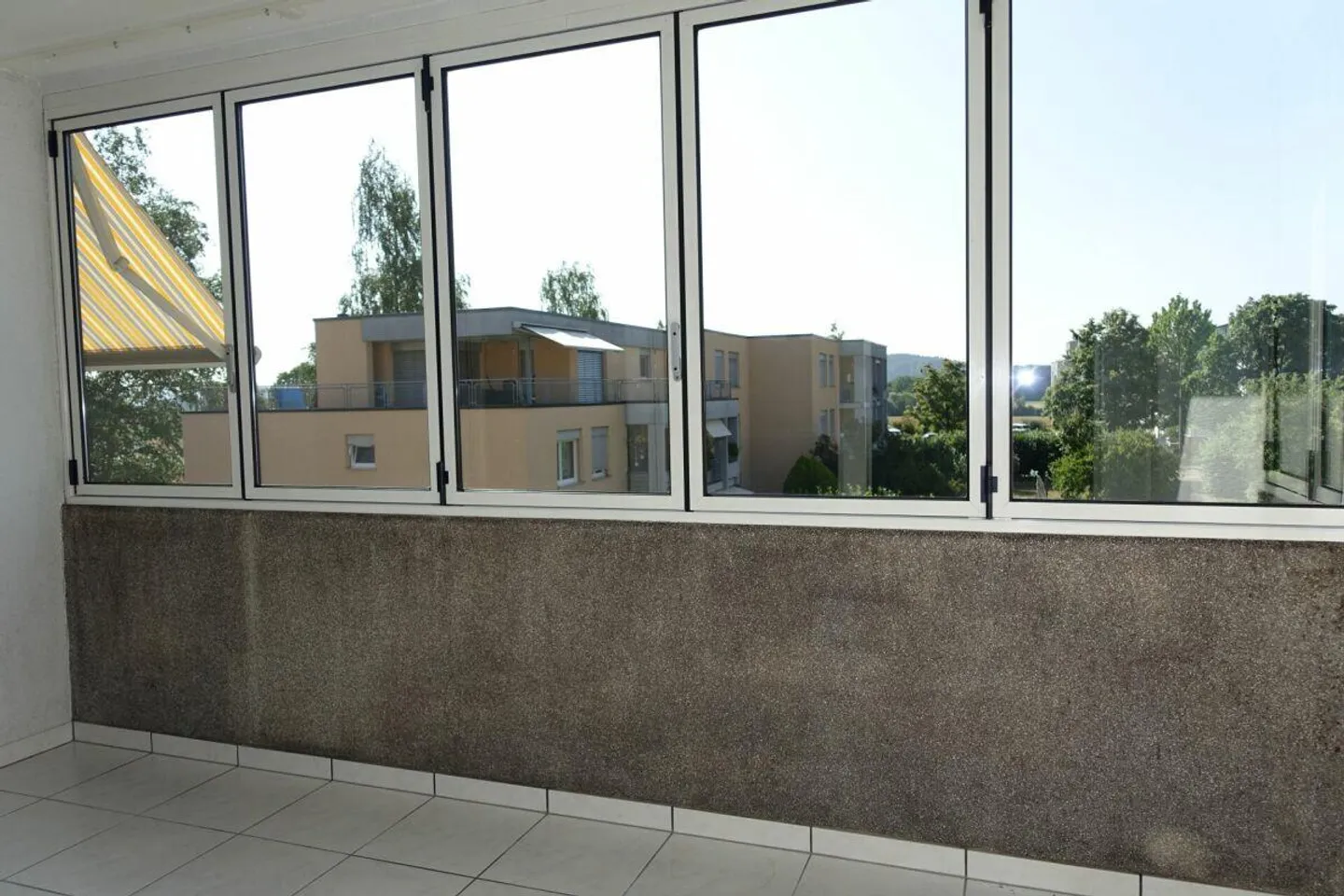 Appartement en copropriété de 3,5 pièces avec balcon et place de parking - Photo 7 sur 21