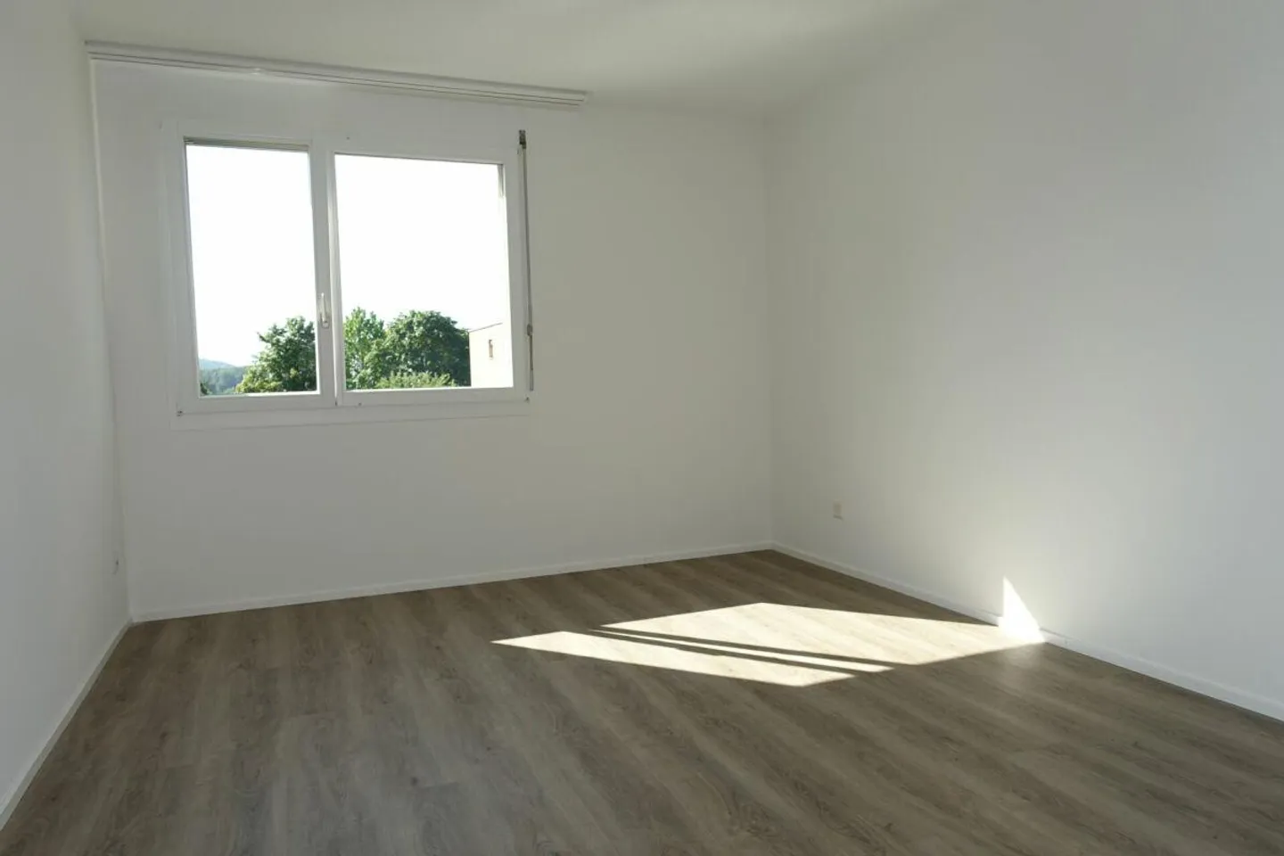 Appartement en copropriété de 3,5 pièces avec balcon et place de parking - Photo 8 sur 21